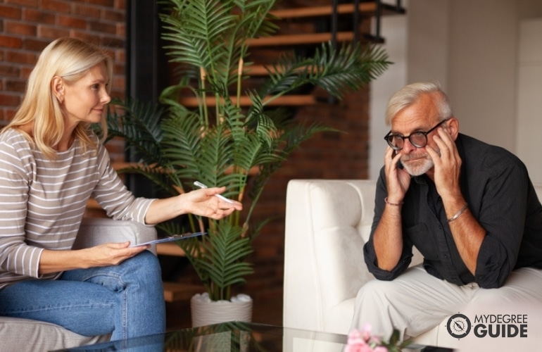 Psychologist in a session with elderly patient