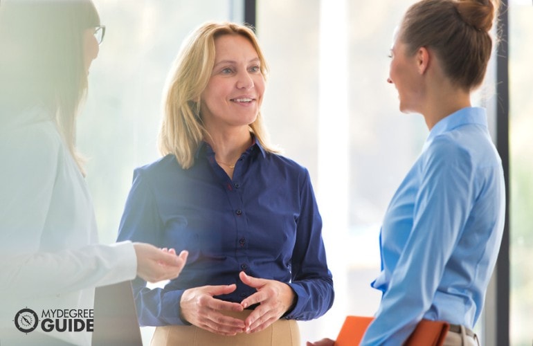 Behavior Analysts meeting in a conference