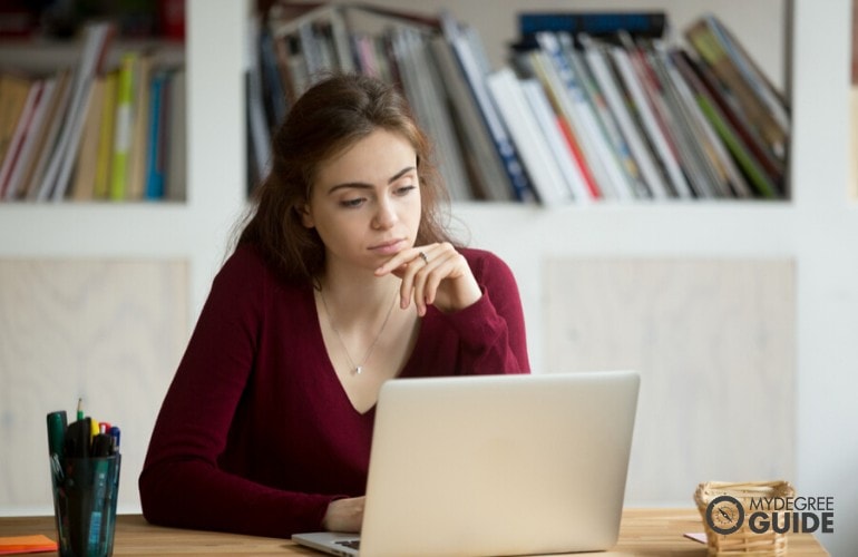 nutrition degree student studying o her laptop