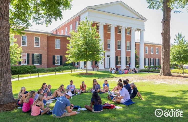 college students studying together in university campus