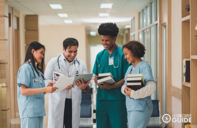 Clinical Medical Assistants receiving instructions from a doctor