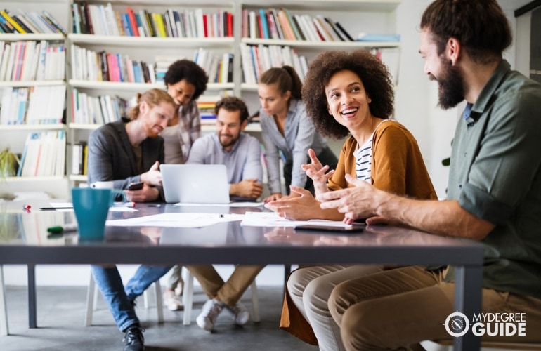 students pursuing PhD in Clinical Psychology, studying in library