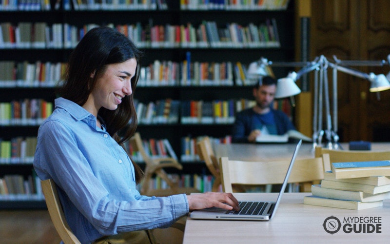 master's student studying in library