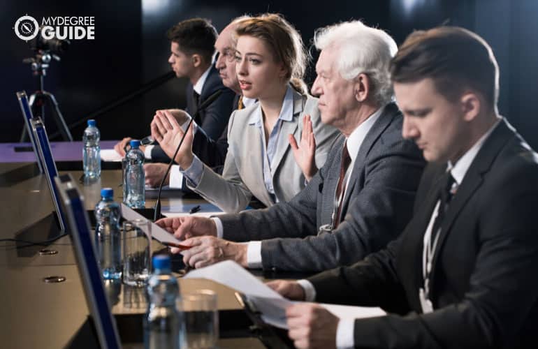 media relations personnel during a public interview