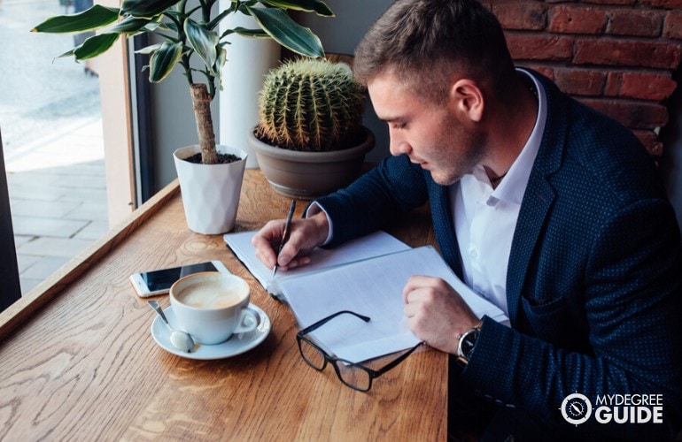 sales manager working at a cafe