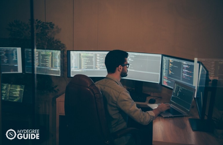 computer programmer working in office