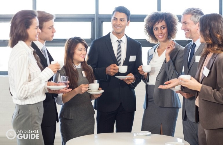 Computer Programmers meeting at a conference