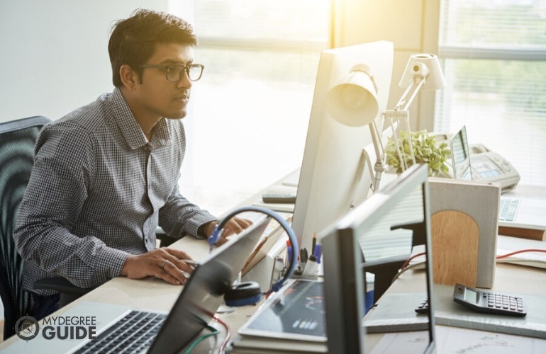 web developer working on his computer