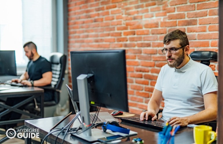Software Developers working in an office