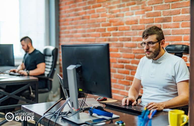 Software Developers working in an office