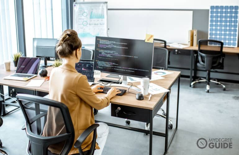 female programmer working in an office