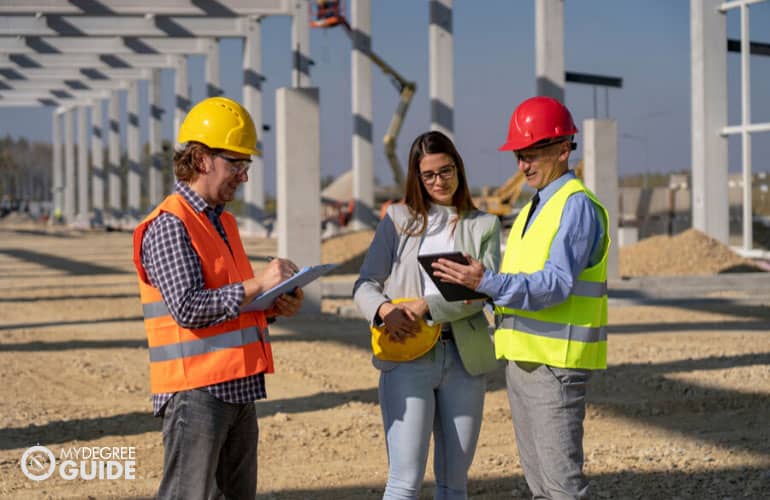 construction managers having a meeting in a construction site