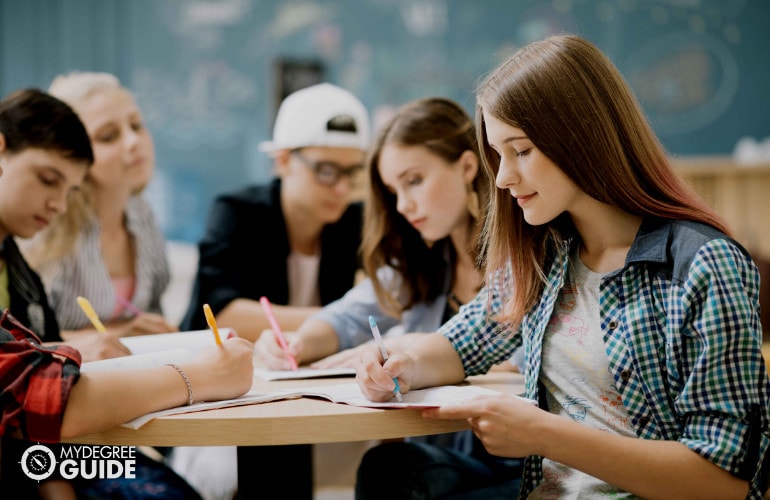 university students taming up during a classroom activity