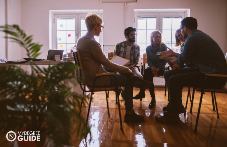 counselor in a group therapy session