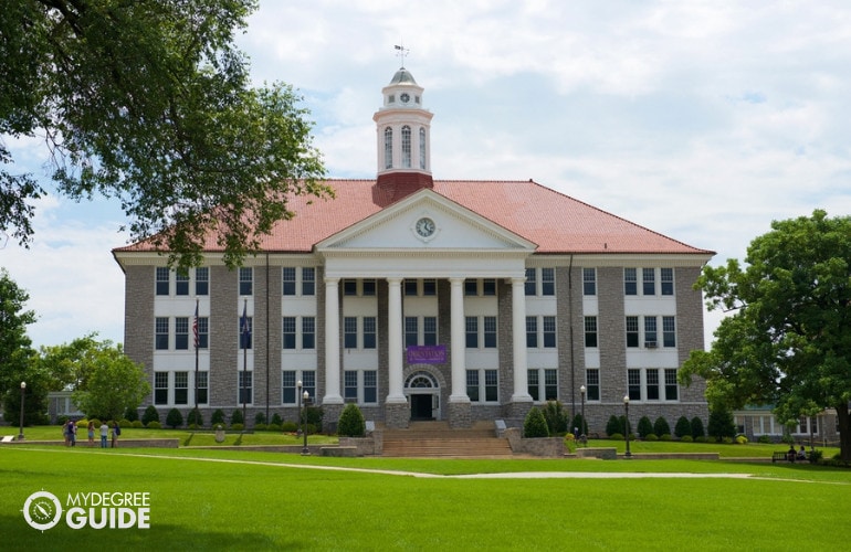 professionals taking a tour in a university campus