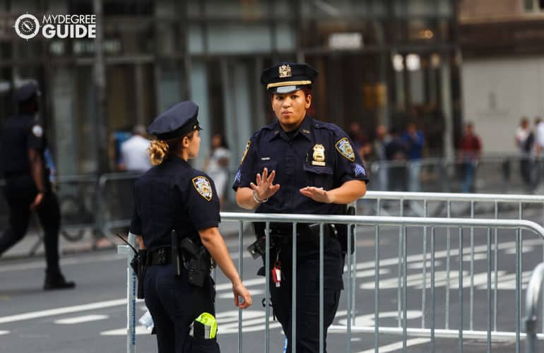 policewomen working in downtown area