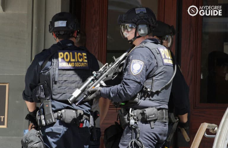 police officers entering a building