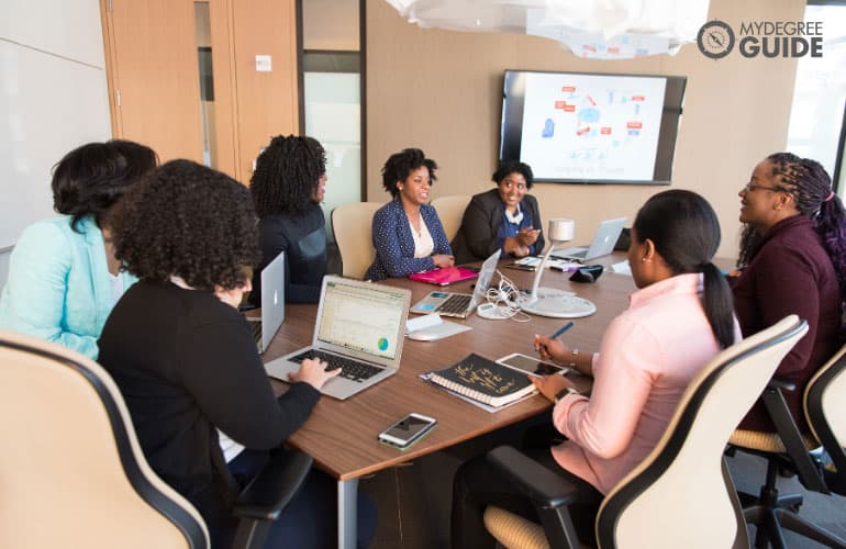 education curriculum planners having a meeting