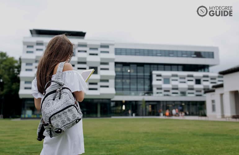 someone walking across campus