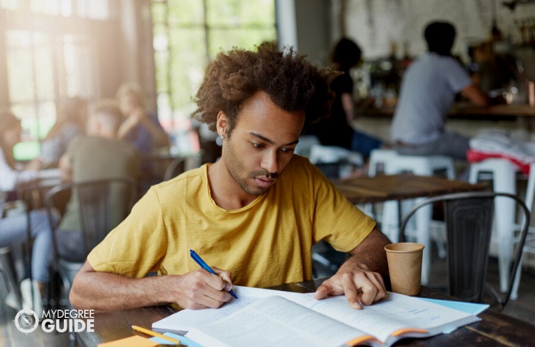 male student studying