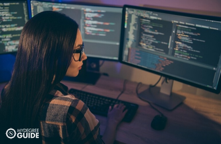 web developer working on her computers