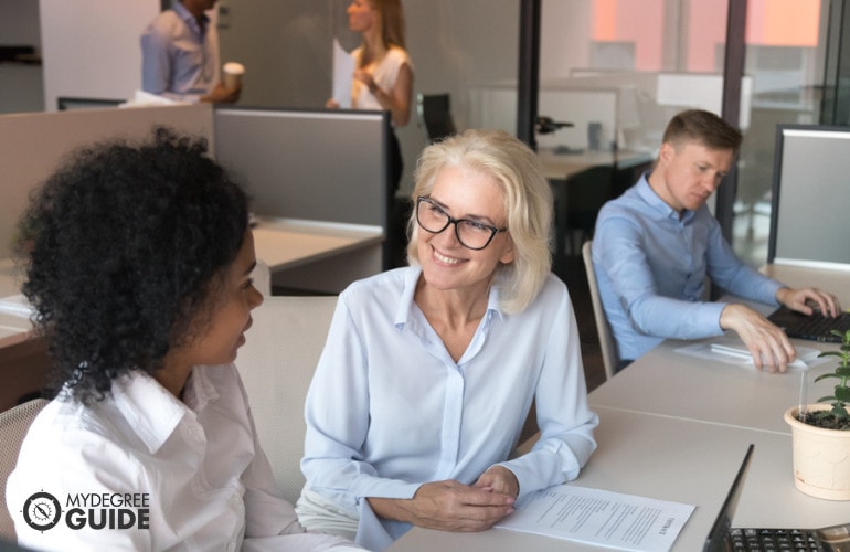 Human Resources Manager talking to an employee