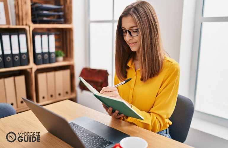 Woman getting her Doctoral Degree in Biology Online