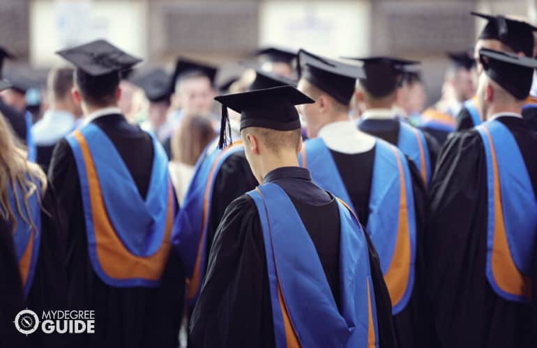 doctoral students at a graduation ceremony