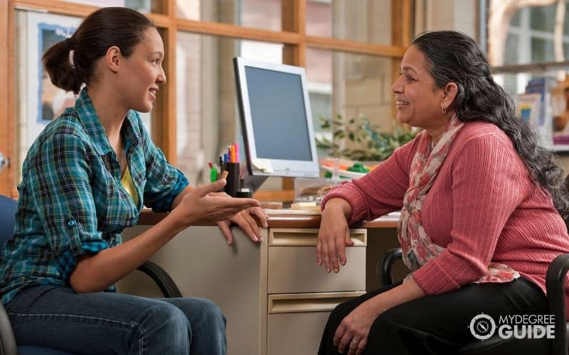 school counselor meeting with a student