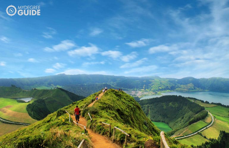 someone walking in a long but picturesque trail