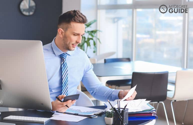 economist working in his office