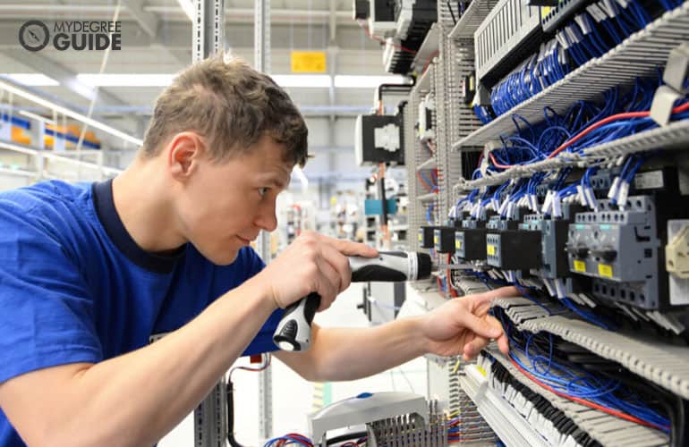 electrical engineer working on wires