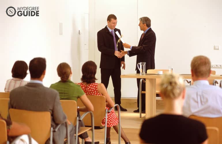 emergency management professional receiving a certificate