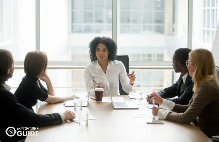 human resource manager meeting with company's employees