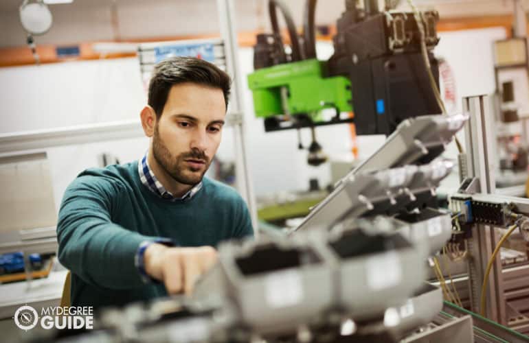 mechanical engineer working on machines