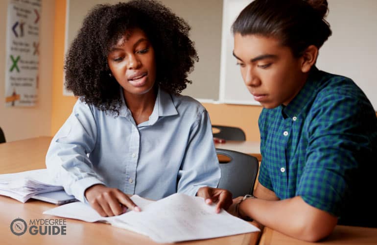 English tutor teaching a foreign student