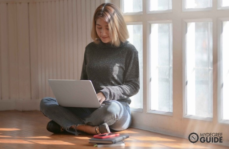 someone studying on her computer