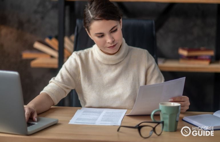 Woman preparing requirements for Environmental Management Bachelor's 