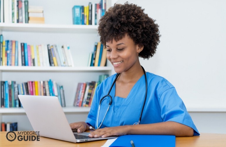 nursing student studying in a library