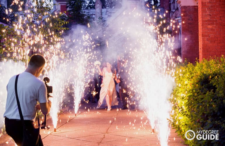 videographer taking videos during a wedding