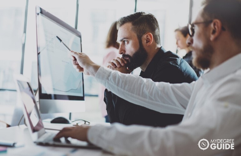 accountants looking at computer