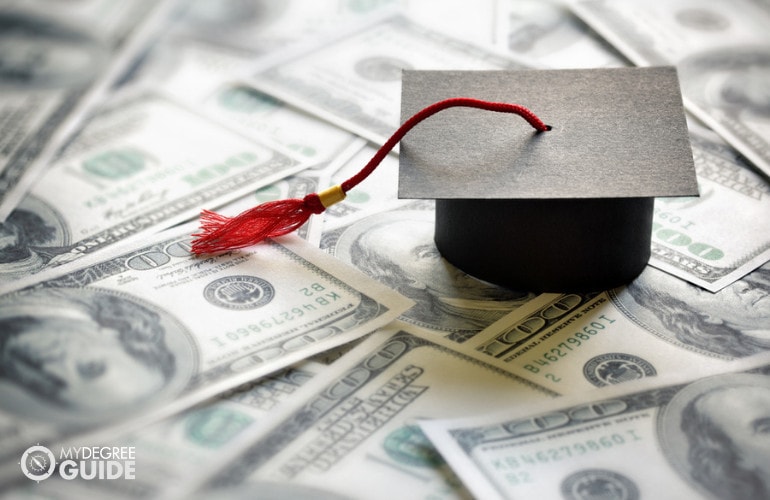 male student filling out financial paperwork