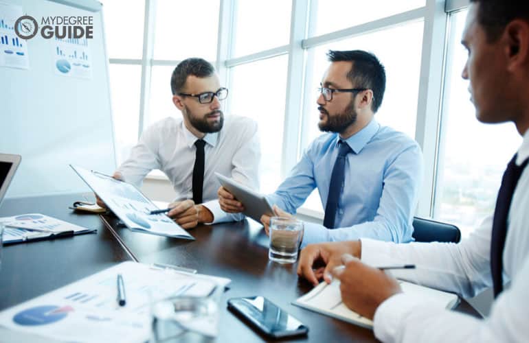 team of financial analysts working in an office