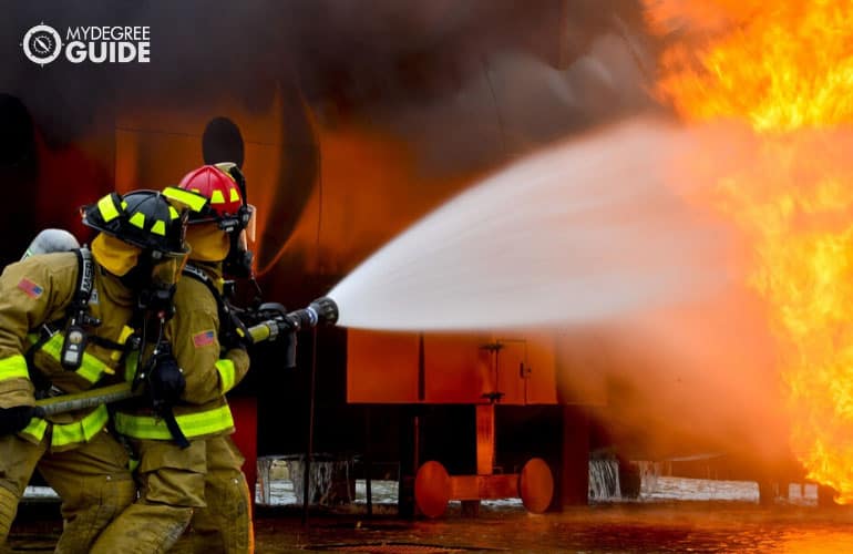 firefighters putting out a fire