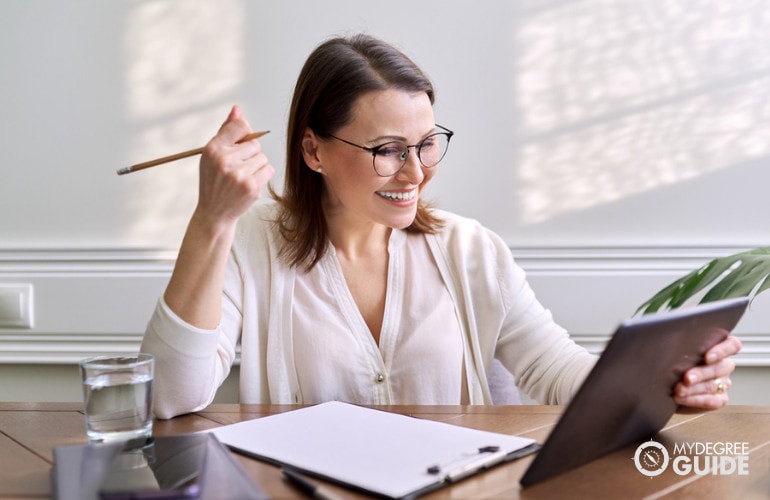 Forensic Psychologist working in her office