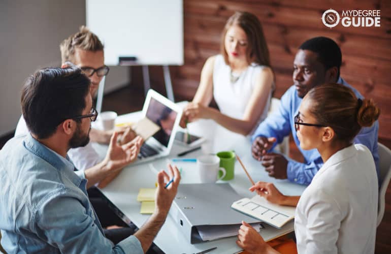 multi-ethnic team discussing ideas during a meeting