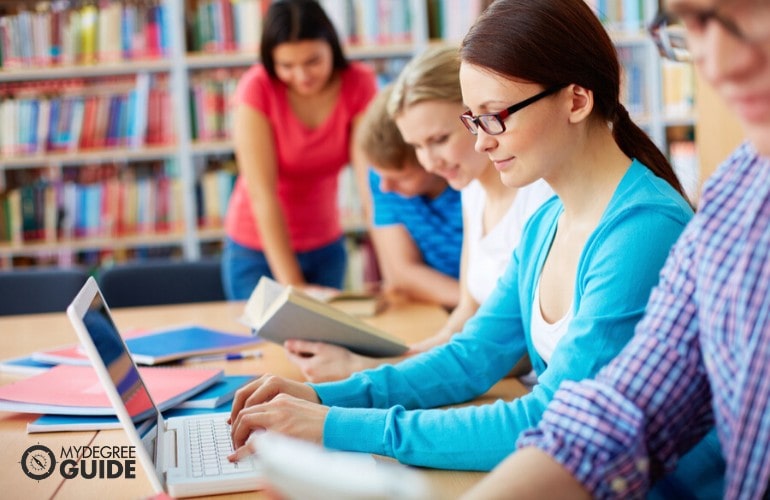 Degree in Addiction Counseling Counseling students studying in library