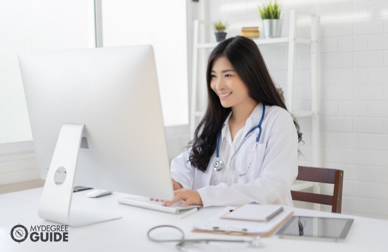 Health Informatics student studying in her office