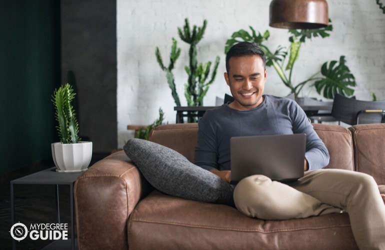 emergency management degree student studying at home