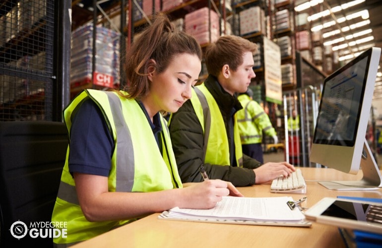 supply chain managers checking the inventory